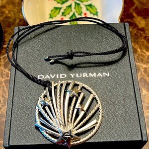 David Yurman Starburst necklace or ornament with dangle black cord.